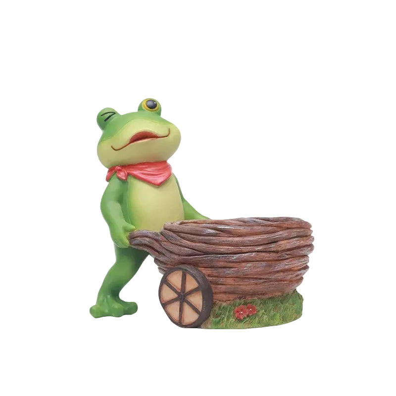 "Frog Tale" resin frog planter in Basket Hauler — hand-painted frog with red bandana pushing a wicker basket cart planter, white background