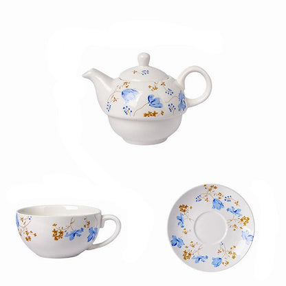 White porcelain tea for one set with blue chicory flowers and gold botanical details, showing teapot, cup and saucer displayed separately on white background