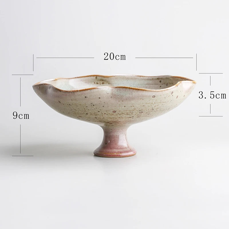 "Ivory Blush ceramic pedestal bowl with reactive glaze and blush-toned base, 20cm diameter"
