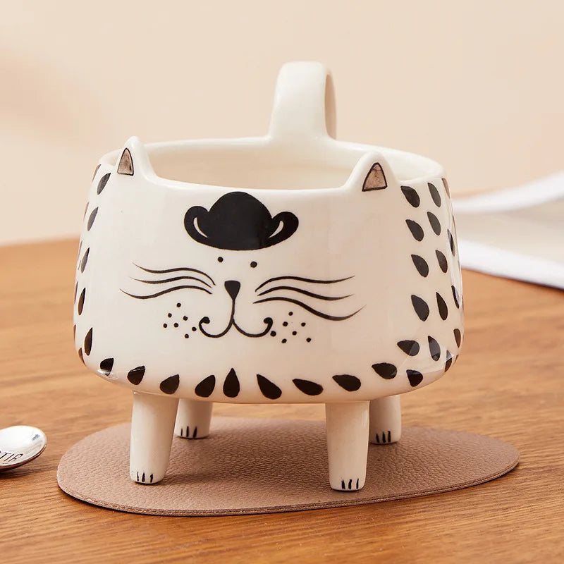 clHouse & Home
Cat coffee mug 

Novelty ceramic cat mug

Four-legged animal mug

Cute meow mug for girls

Funny cat lover gift

3D cat shaped mug

Kawaii kitchen accessories

Novelty tea cup with legs

Gift for cat ladies