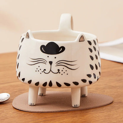 clHouse & Home
Cat coffee mug 

Novelty ceramic cat mug

Four-legged animal mug

Cute meow mug for girls

Funny cat lover gift

3D cat shaped mug

Kawaii kitchen accessories

Novelty tea cup with legs

Gift for cat ladies
