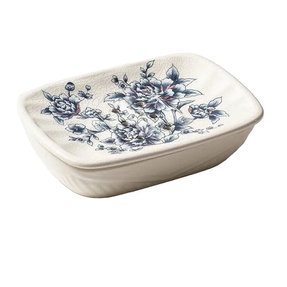 Rectangular flat ceramic soap dish with blue peony chinoiserie print and crackle-glaze finish, angled view on white background
