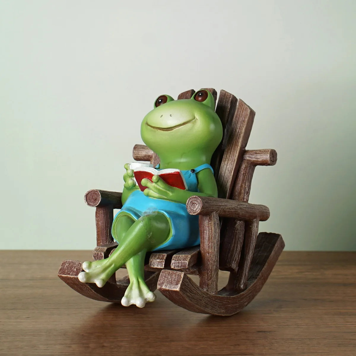 Rocking coffee frog figurine

Reading frog garden statue

Whimsical office desk decor 

Coffee lover gift ideas

Modern art frog decor

Relaxing desktop ornaments