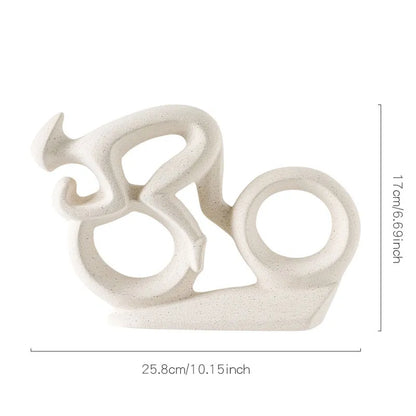 Abstract cyclist statue

Ceramic biker sculpture

Cycling gift ideas 

Minimalist office decor

Contemporary bike ornament

Cyclist shelf decoration

Modern art rider figurine

Road bike sculpture

Luxury cycling accessories

