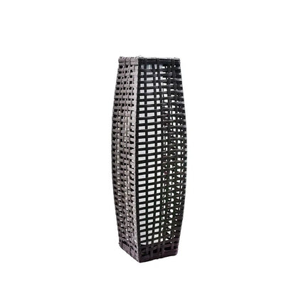 Tall woven wicker solar floor lantern in dark brown, concave column silhouette — front view on white background