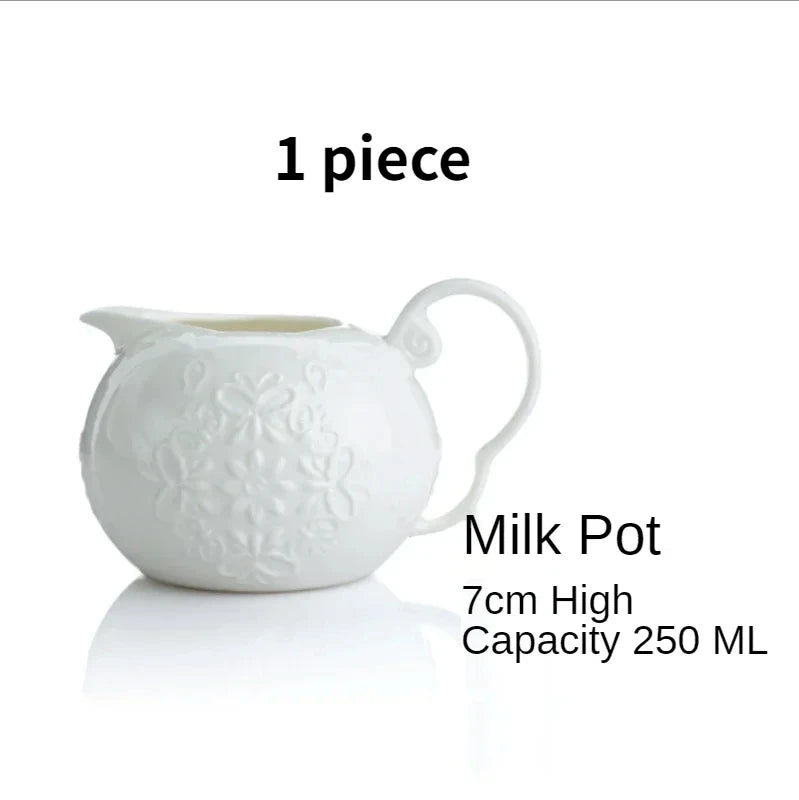  (Milk Jug):

"White embossed bone china milk jug with floral relief and curved handle — CL House Tea Time"