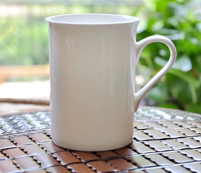 White porcelain cup

Ceramic tea mug

Minimalist coffee tumbler

Plain white porcelain taza