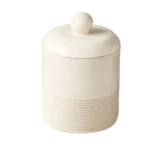 Chalk Stone wabi-sabi ceramic storage jar with domed lid and round ball knob, full front view on white background showing warm cream stone texture and ribbed base detail