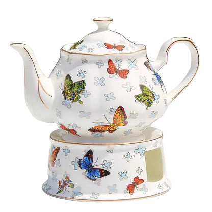  (Teapot 850ml):

"White bone china teapot with butterfly botanical print and gold trim, 850ml — CL House Tea Time"