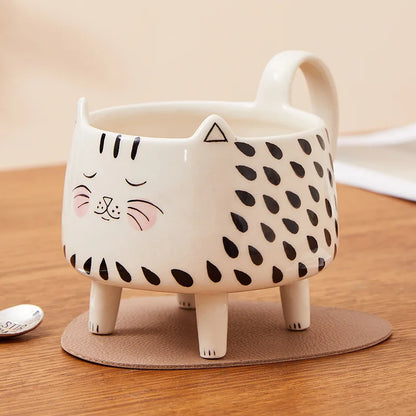tea mug

paws & pour

novelty mug

microwave safe mug

dishwasher safe mug

cute mug

coffee mug

ceramic mug

ceramic cat mug

cat mug with legs

cat mug

cat lover gift