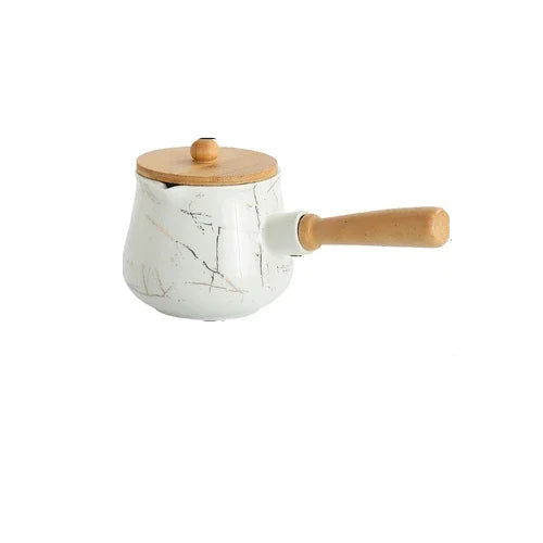 White marble ceramic milk jug with bamboo lid and round knob, wooden handle, side view on white background — Medium variant of the Marble Pour Ceramic Milk Jug by CL House