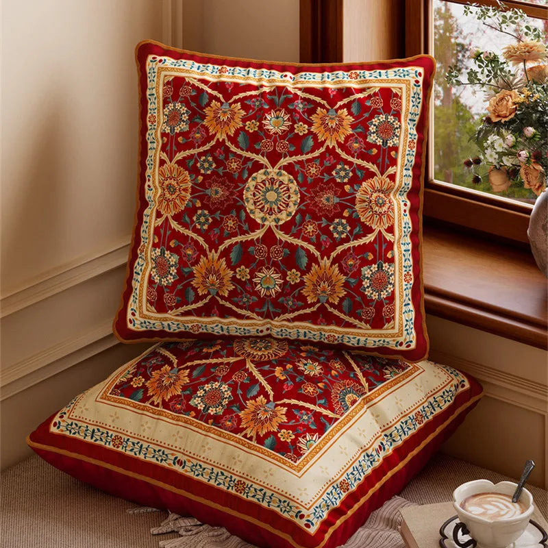 "Crimson Court" Persian-style velvet cushion cover — deep crimson ground with all-over medallion floral pattern in amber, teal and ivory, ornate border, crimson reverse with gold piping, 45×45cm — CL House