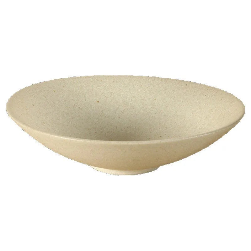 Speckled clay handcrafted ceramic pasta bowl in soft cream with wide flared rim and footed base, shown on white background — Speckled Sand variant