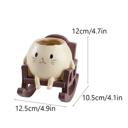 Cat rocking chair planter

Cute succulent pot 

Desk stress relief ornament

Resid cat flower pot

Mini planter with drainage

Whimsical office decor

Rocking chair plant holder

Gift for cat lovers

Creative tabletop statue