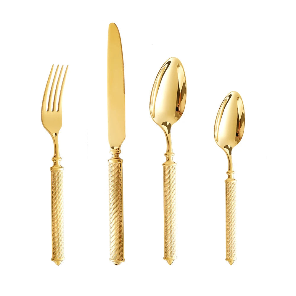 "Twisted Rope" gold stainless steel cutlery set — front view showing fork, knife, dinner spoon and tea spoon with engraved twisted rope handles — white background