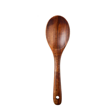 "Wild Harvest" acacia wood serving spoon with deep bowl and long handle, natural wood grain, white background
