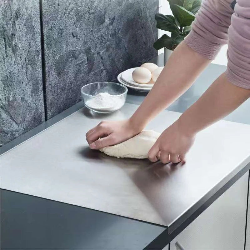 clHouse & Home
Stainless steel chopping board Worktop protector with lip Steel dough kneading board

L-shaped stainless steel board Anti-bacterial cutting surface Chef-grade kitchen accessories

Hygienic meat cutting board Metal pastry board Professional kitchen worktop guard