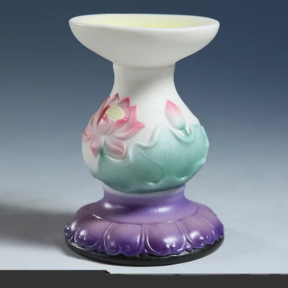 Ceramic lotus candle holder

Hand-painted lamp holder

Feng Shui home decor

Lotus butter lamp

Handmade tea light holder

Oriental room accessories

Meditation room decor

Artisanal ceramic ornament

Spiritual home gift