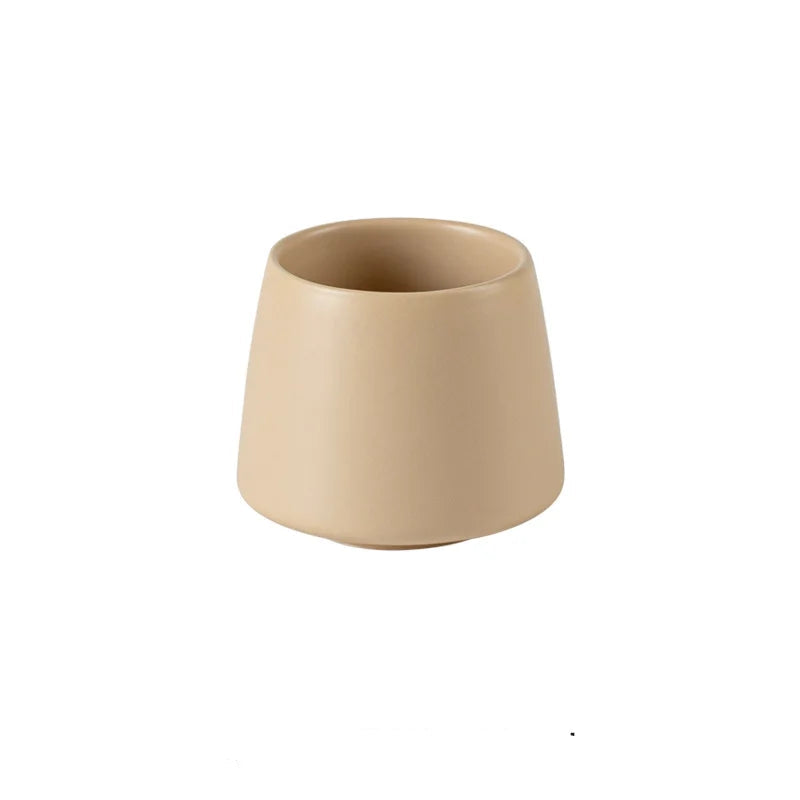 Single cone-shaped matte oat white ceramic cup, warm beige finish, 200ml, bathroom toothbrush holder, white background