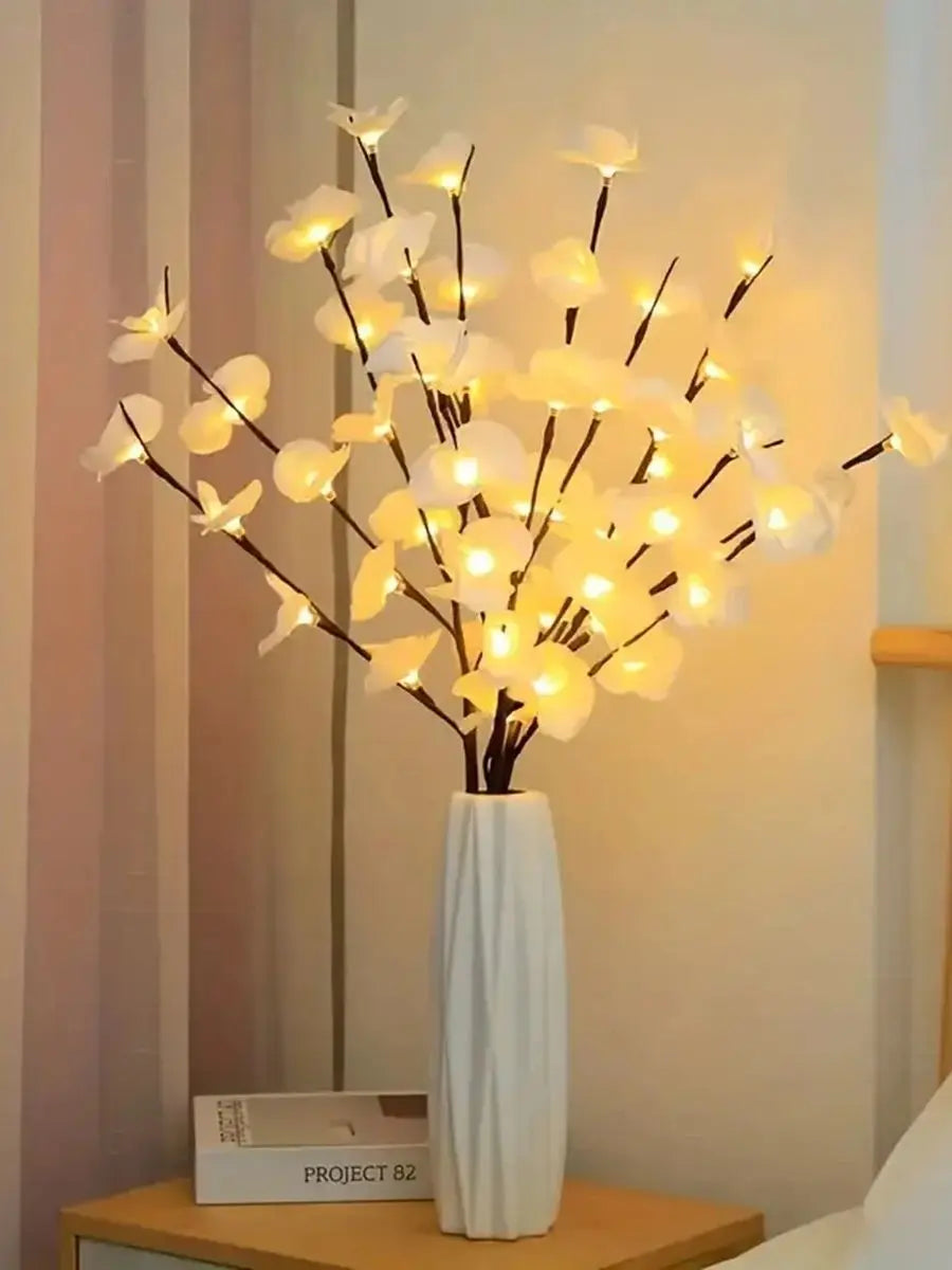 Artificial flower branch lights

White LED floral decor

Aesthetic room lighting UK

DIY wedding flower lights

Realistic lighted orchid stems

Bedroom ambient lighting

Decorative floral branches

Moth orchid room decor