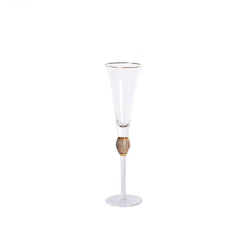 "Golden Jewel" Champagne Flute with gold rim and micro-crystal bead stem, on a white background