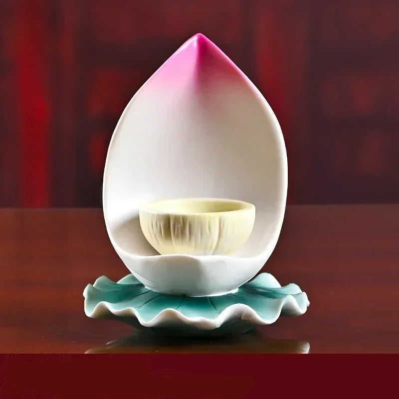 Ceramic lotus candle holder

Buddhist butter lamp holder

Feng Shui home decor UK

Lotus flower altar supplies

Spiritual home ornaments

Zen meditation accessories

Premium ceramic candle stand

High-grade Buddha ware

Decorative tea light holder
