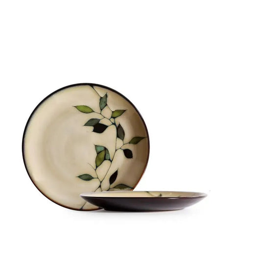 "Painted Leaf" ceramic dinner plate front and side view, hand-painted leaf motif in ivory and espresso glaze, 21.5cm, white background