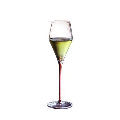 "Ink Line" geometric crystal wine glass with red stem filled with a drink, bold geometric design — CL House Drinkware collection