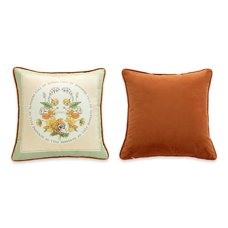  "Full of Sunshine" botanical velvet cushion cover front and back view, cream ground with sage green border, circular bouquet of yellow and amber florals with typographic ring "Full of Sunshine", plain burnt orange velvet reverse with orange piping — CL House Cushions collection