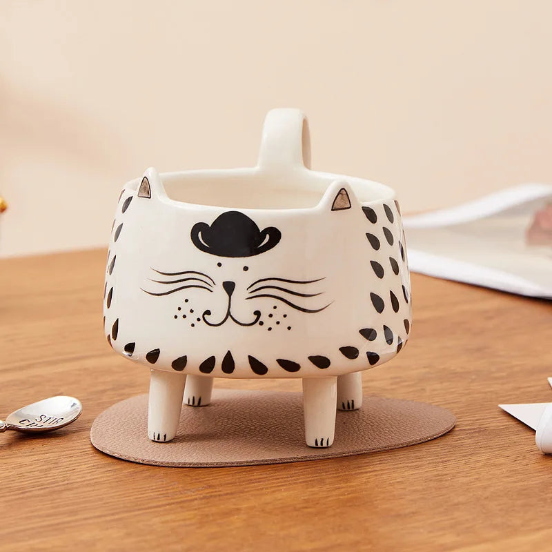 tea mug

paws & pour

novelty mug

microwave safe mug

dishwasher safe mug

cute mug

coffee mug

ceramic mug

ceramic cat mug

cat mug with legs

cat mug

cat lover gift