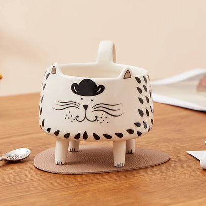 tea mug

paws & pour

novelty mug

microwave safe mug

dishwasher safe mug

cute mug

coffee mug

ceramic mug

ceramic cat mug

cat mug with legs

cat mug

cat lover gift