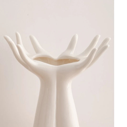  Open Hands white ceramic vase close-up showing open palms and hollow centre, cream background