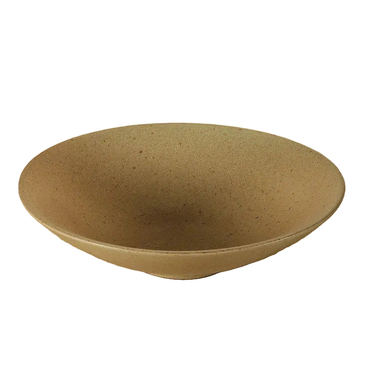 Speckled clay handcrafted ceramic pasta bowl in warm ochre with matte finish and footed base, shown on white background — Speckled Clay variant