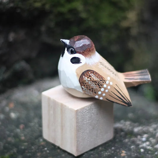 	"Little Sparrow" hand-carved wood bird figurine, close-up front view showing painted facial detail, CL House