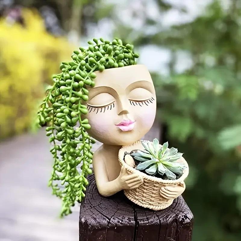 Flora Muse: Maceta con cara de niña artística