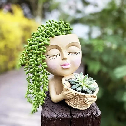 Flora Muse: Maceta con cara de niña artística