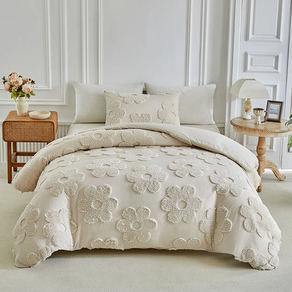 "Daisy Field" tufted cotton duvet cover set with pillowcase displayed on a double bed in a classic white bedroom with rattan nightstand and floral arrangement

