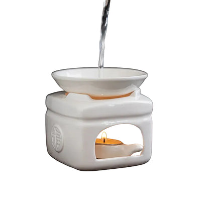 "Zen Glow" white porcelain oil burner and tea warmer — sculptural design — CL House Candles & Fragrance