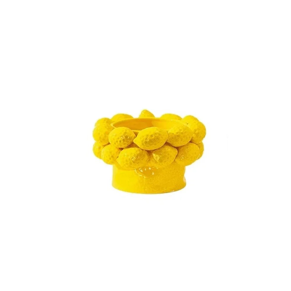Yellow ceramic bowl vase with three-dimensional lemon relief detailing and sunshine yellow glaze, on white background, Small Bowl variant of the Lemon Grove collection
