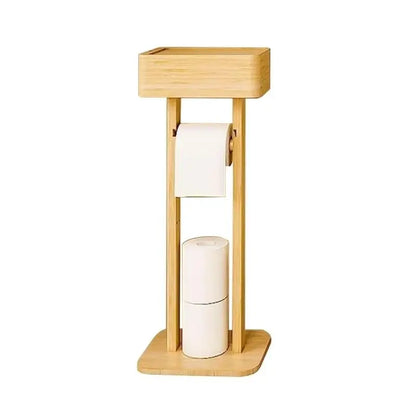 Freestanding bamboo toilet paper holder with closed storage box on top, one roll in the holder and spare roll stored at the base, white background