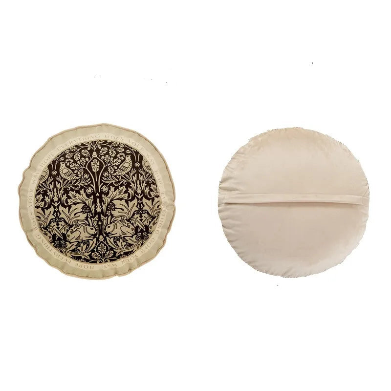 "Dark Forest" botanical velvet round cushion cover front and back view, dark chocolate ground with ivory tree of life, birds and rabbits botanical motif, scalloped cream border with typographic trim, plain cream velvet reverse — CL House Cushions collection