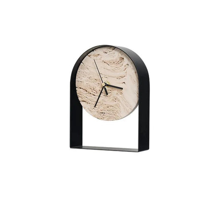 Black metal arched table clock with a natural travertine stone dial, shown with dimensions of 15 cm wide, 5 cm deep and 20 cm tall