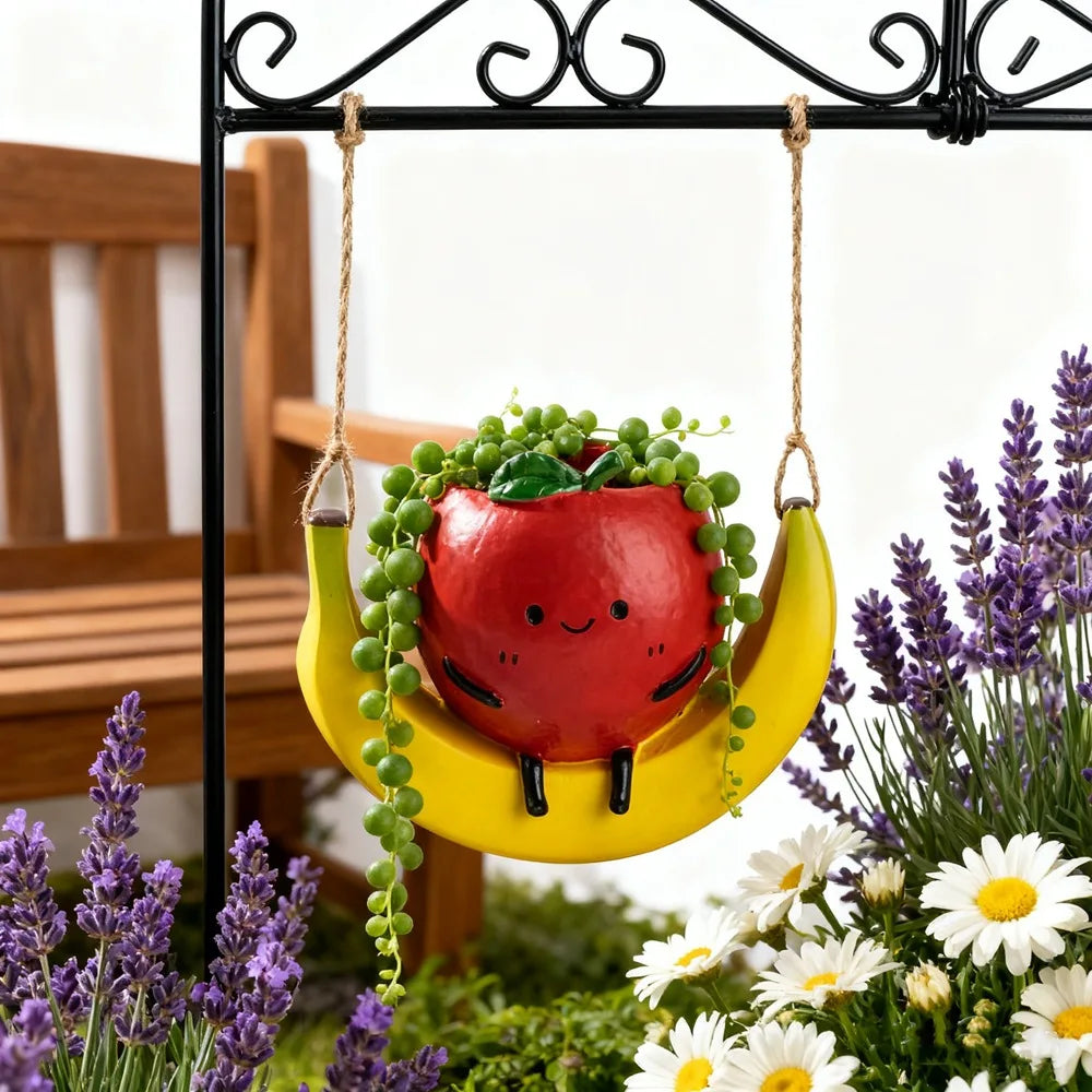 Fruit shaped hanging planter

Banana swing plant pot

Cute apple succulent holder

Hanging orange flower pot

Novelty garden ornaments

Small indoor hanging pots

Unique gift for plant lovers

