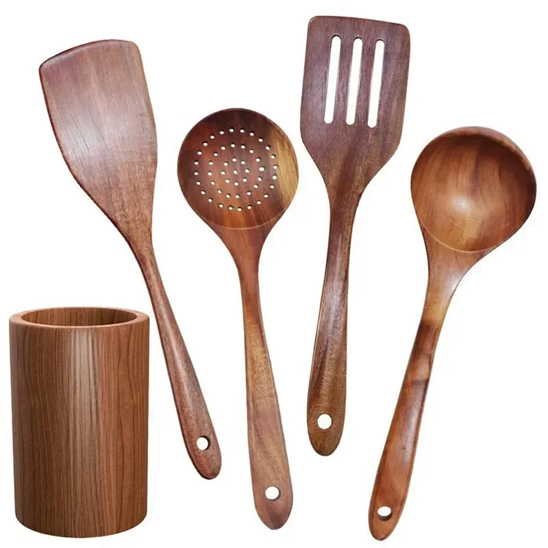 Complete teak wood cooking utensil set laid out on white background — wok spatula, skimmer, slotted spatula, ladle and cylindrical teak holder displayed separately, showing natural wood grain and unique texture of each piece — Teak Grove Utensil Set by CL House
