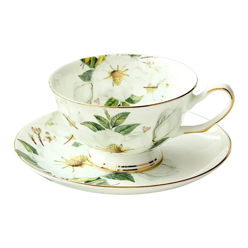 "White Camellia" fine bone china tea cup with camellia floral design and gold rim on white background — CL House & Home