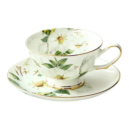 "White Camellia" fine bone china tea cup with camellia floral design and gold rim on white background — CL House & Home