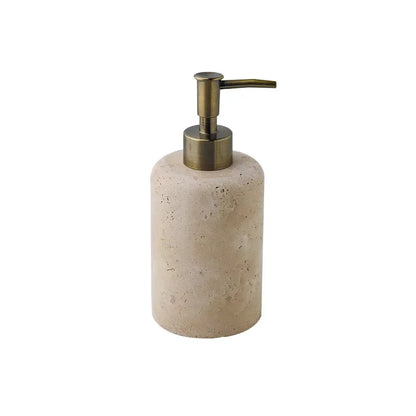  Natural travertine soap dispenser with bronze pump, cylindrical form, warm beige stone texture, 7.5 × 17 cm — wabi-sabi bathroom accessory
