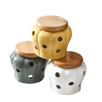 Set of three pumpkin-shaped ceramic storage jars with bamboo lids in mustard yellow, slate grey and chalk white, CL House & Home