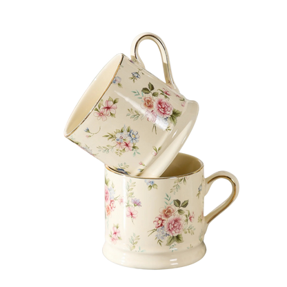 Two "English Garden" floral ceramic mugs stacked, with pink rose print and gold rim detail, white background — CL House & Home