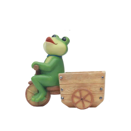 "Frog Tale" resin frog planter in Cycle Cargo — hand-painted frog riding a bicycle with a wooden cargo box planter, white background